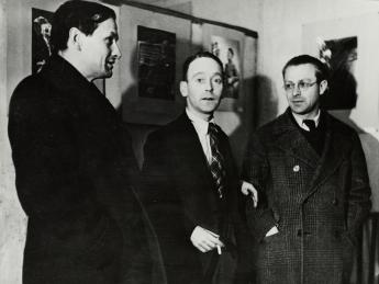 John Heartfield, Gustav Regler and Tristan Tzara at the Heartfield exhibition, Paris,1935. photo: Akademie der Künste, Berlin, JHA 607/23.4.1.